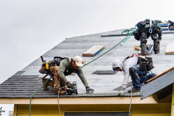 Professional Gutter Installation technician working in Home, PA
